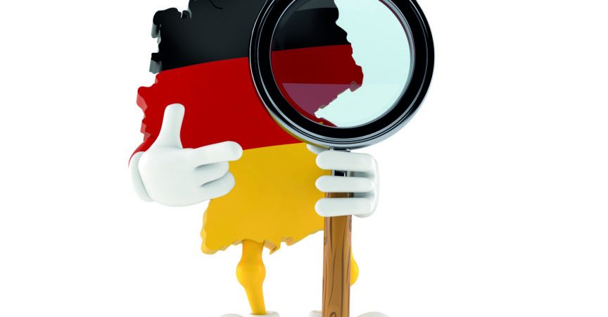 Deutscher Charakter mit Lupe isoliert auf weißem Hintergrund. 3D-Darstellung