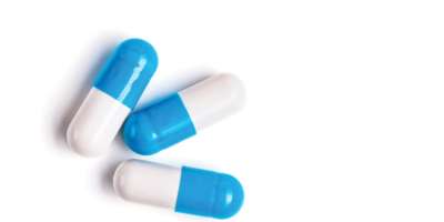 Drei Tabletten in blau und weiss