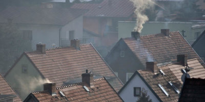Houses and dirty smoke from the chimney