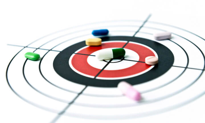 drugs, pills, capsules, tablets on the target, bull's eye