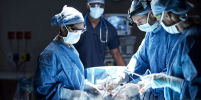 Shot of a team of surgeons performing a surgery in an operating room