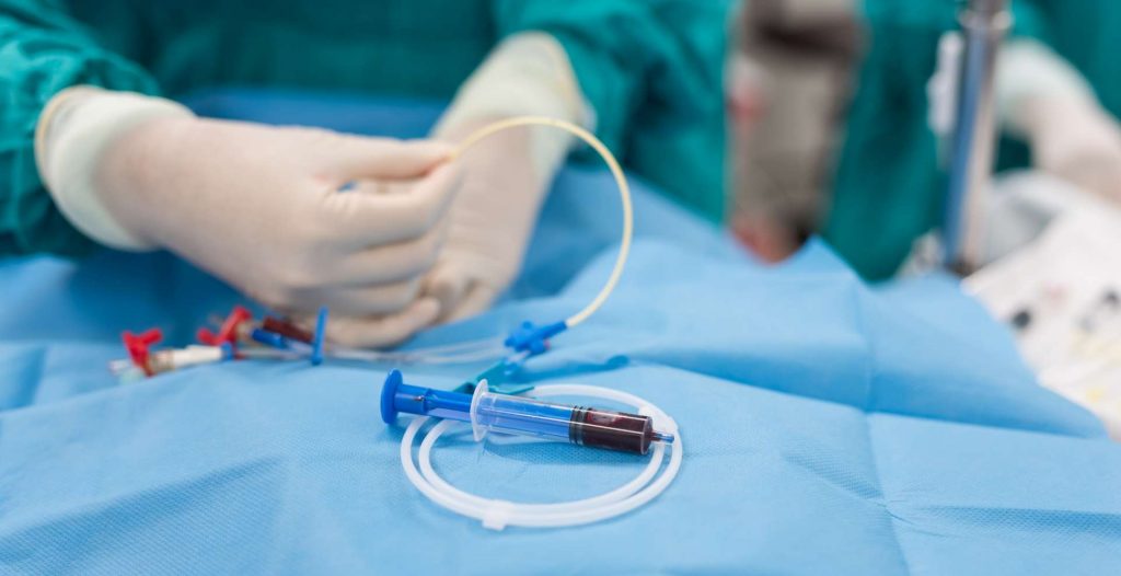 doctor insert double lumen catheter